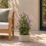 Artificial lavender topiary in a decorative patio planter