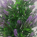 Detail view of layered artificial lavender flowers and leaves