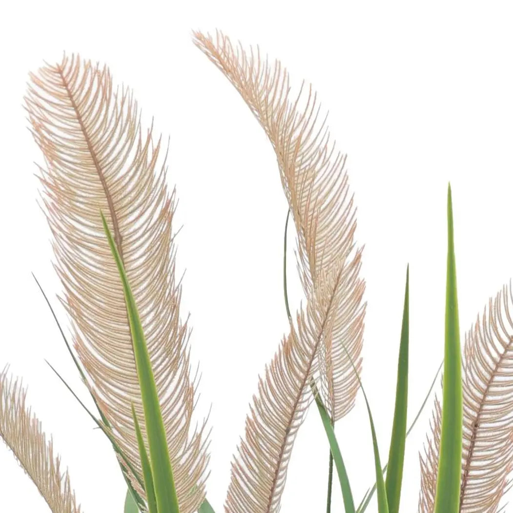 Close-up of beige artificial reed plumes and slender green leaves