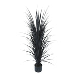 Artificial potted plant with long black leaves on a white background
