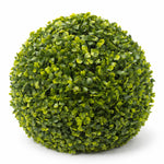 Artificial green sphere with leafy texture on a white background