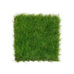Square piece of green artificial grass on a white background