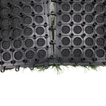 Black plastic grid panels on grass