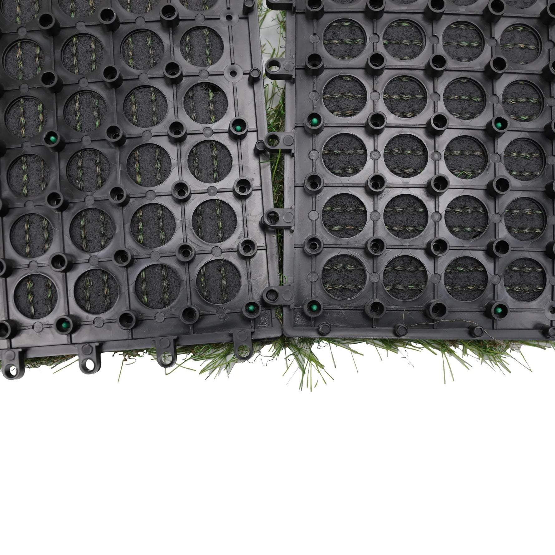 Black plastic grid panels on grass