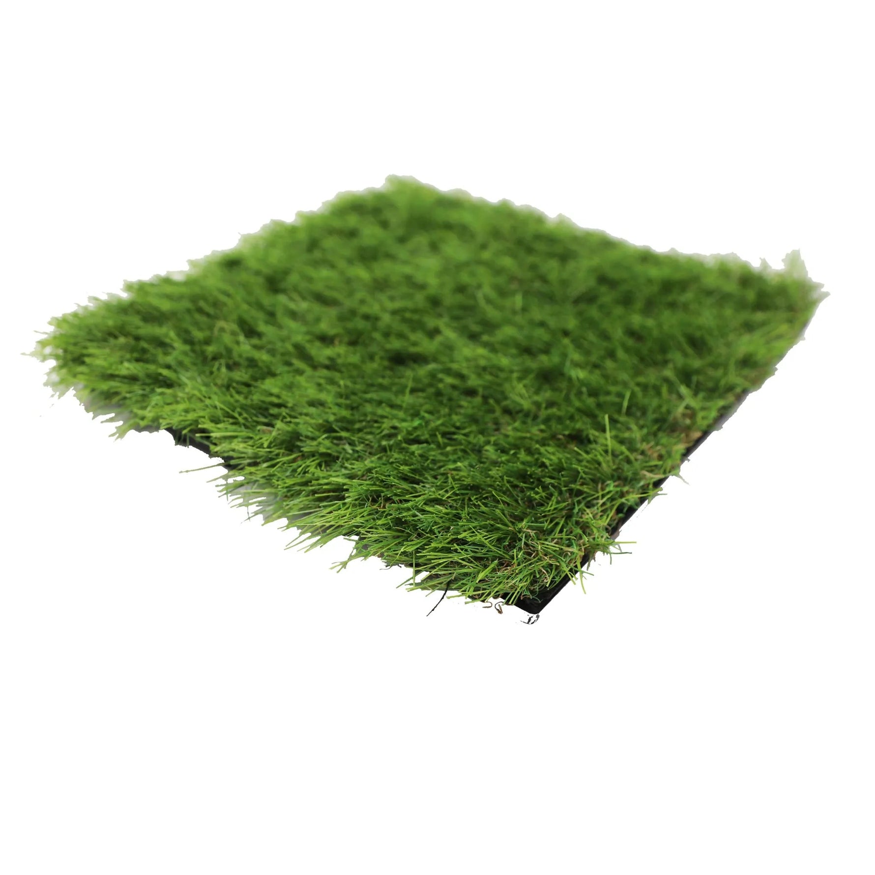 Artificial grass patch on a white background