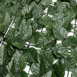 Artificial green leaves on a grid background