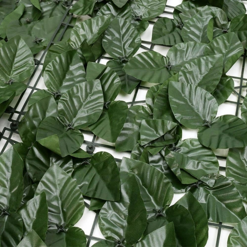 Artificial green leaves on a grid background