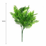 Artificial green leaf branch with measurement on a white background