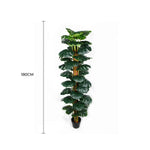 Artificial monstera plant with dimensions on a white background