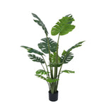 Artificial potted plant with green leaves on a white background