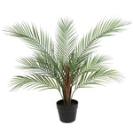 Potted artificial palm plant on a white background