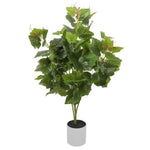 Artificial potted plant with green leaves on a white background
