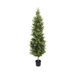 Potted artificial tree on a white background