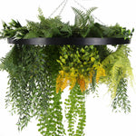 Hanging basket with artificial greenery on a white background