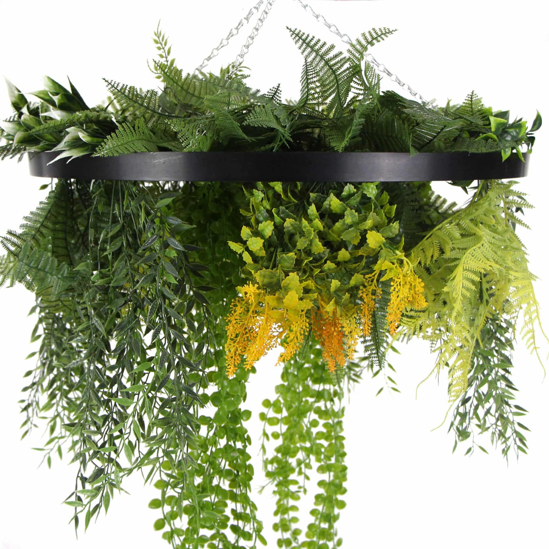 Hanging basket with artificial greenery on a white background
