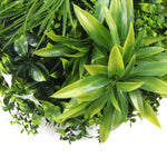 Close-up of green artificial plants with a white background