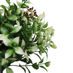 Artificial green plant with white edges on a white background