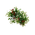 Artificial green leafy wreath with red berries on a white background