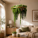 Living room with a hanging plant display and a beige sofa.