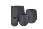 Set of five black ceramic pots on a white background