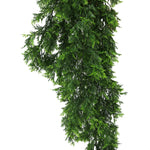 Artificial green garland on a white background