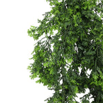 Artificial greenery garland on a white background