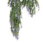 Artificial hanging plant with green leaves and purple flowers on a white background