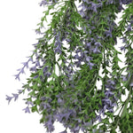 Artificial lavender plant with green leaves and purple flowers on a white background