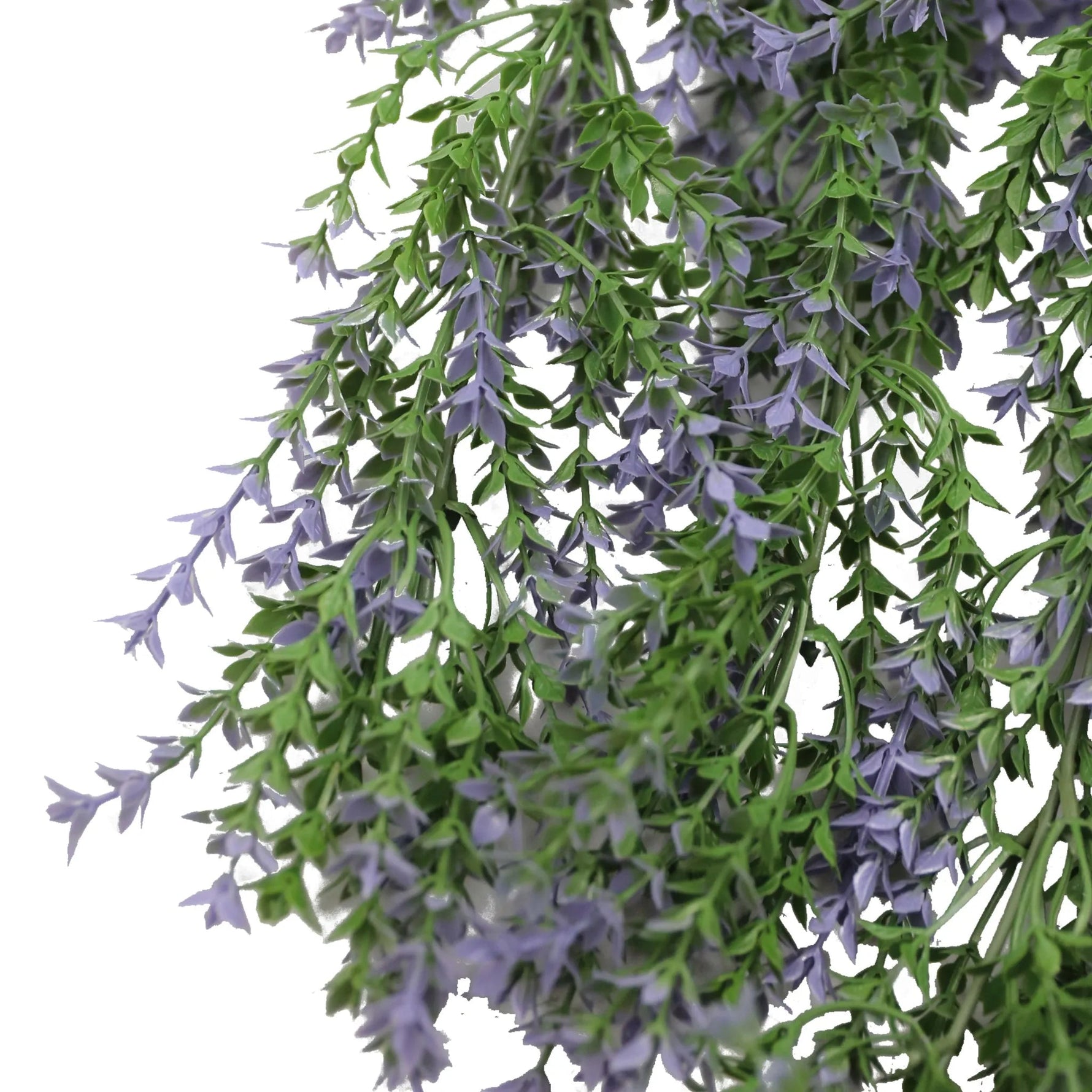 Artificial lavender plant with green leaves and purple flowers on a white background