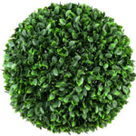 Artificial boxwood ball on a white background