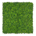 Square piece of artificial greenery on a white background