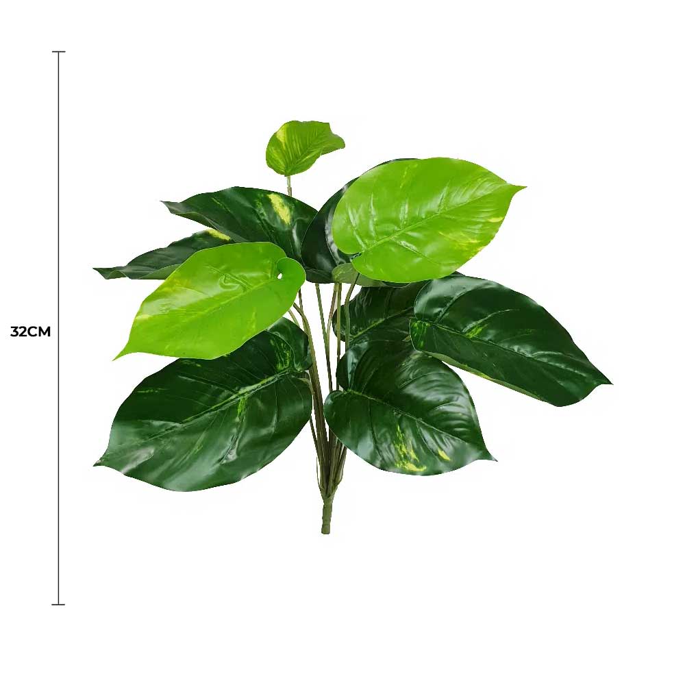 Artificial green leaves with a measurement label on a white background