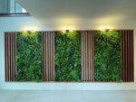 Green wall with wooden slats in a modern indoor setting