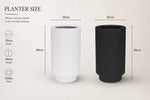Two cylindrical planters, one white and one black, with dimensions labeled on a light gray background.