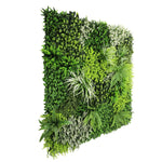 Artificial vertical garden panel with greenery on a white background