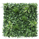 Square arrangement of artificial greenery on a white background