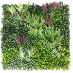 Artificial green wall with various types of plants on a white background
