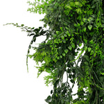 Artificial greenery hanging plant on a white background