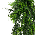 Artificial green leaf garland on a white background