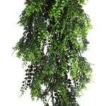 Artificial green leaf garland on a white background