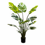 Artificial potted plant with large green leaves on a white background