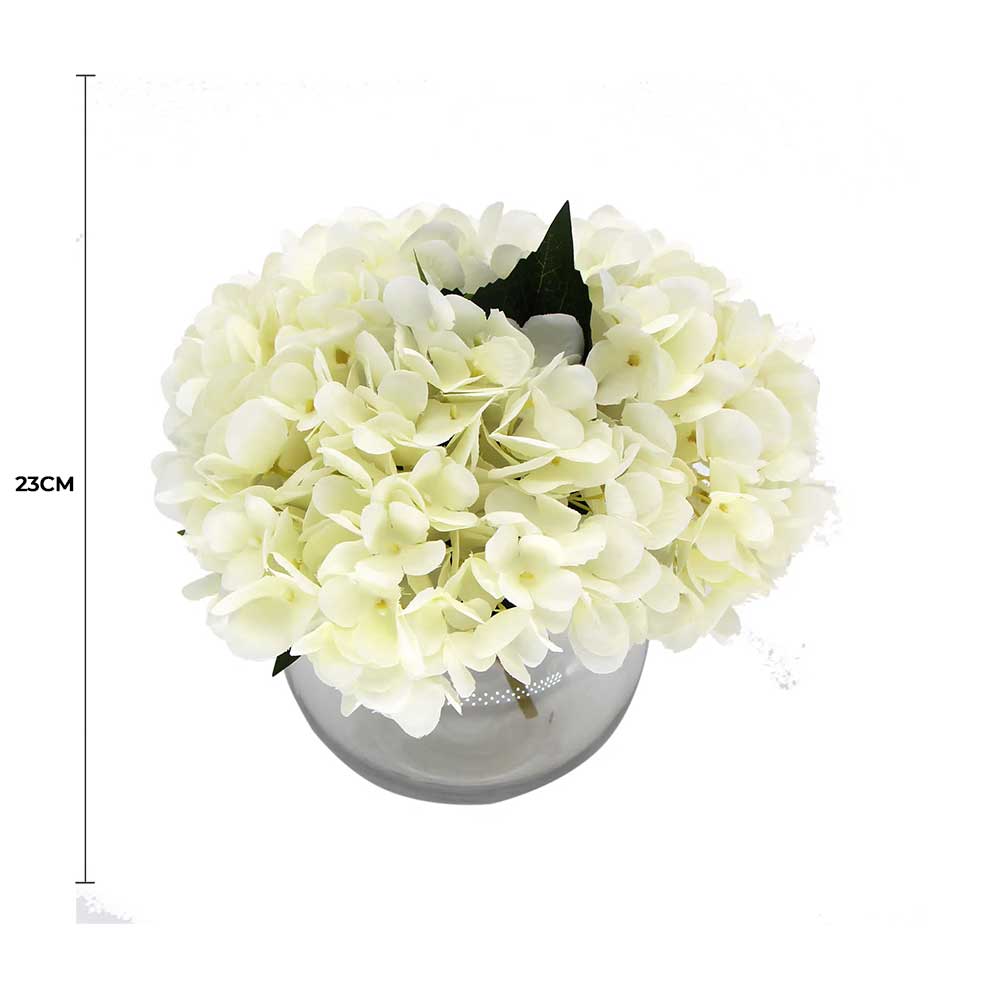 White floral arrangement in a clear vase with dimensions indicated on a white background