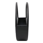 Black metal magazine holder on a white background