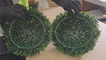 Step-by-step installation of a Designer Plants artificial topiary ball, demonstrating how to connect, secure, and display the faux greenery sphere for stylish indoor or outdoor decoration.