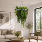 Living room with a hanging fern plant, beige sofa, and armchair.