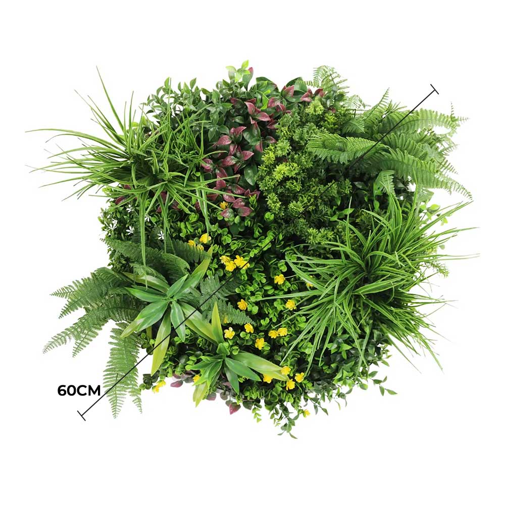 Artificial green wall with various plants on a white background
