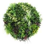 Artificial greenery wreath with various types of plants on a white background