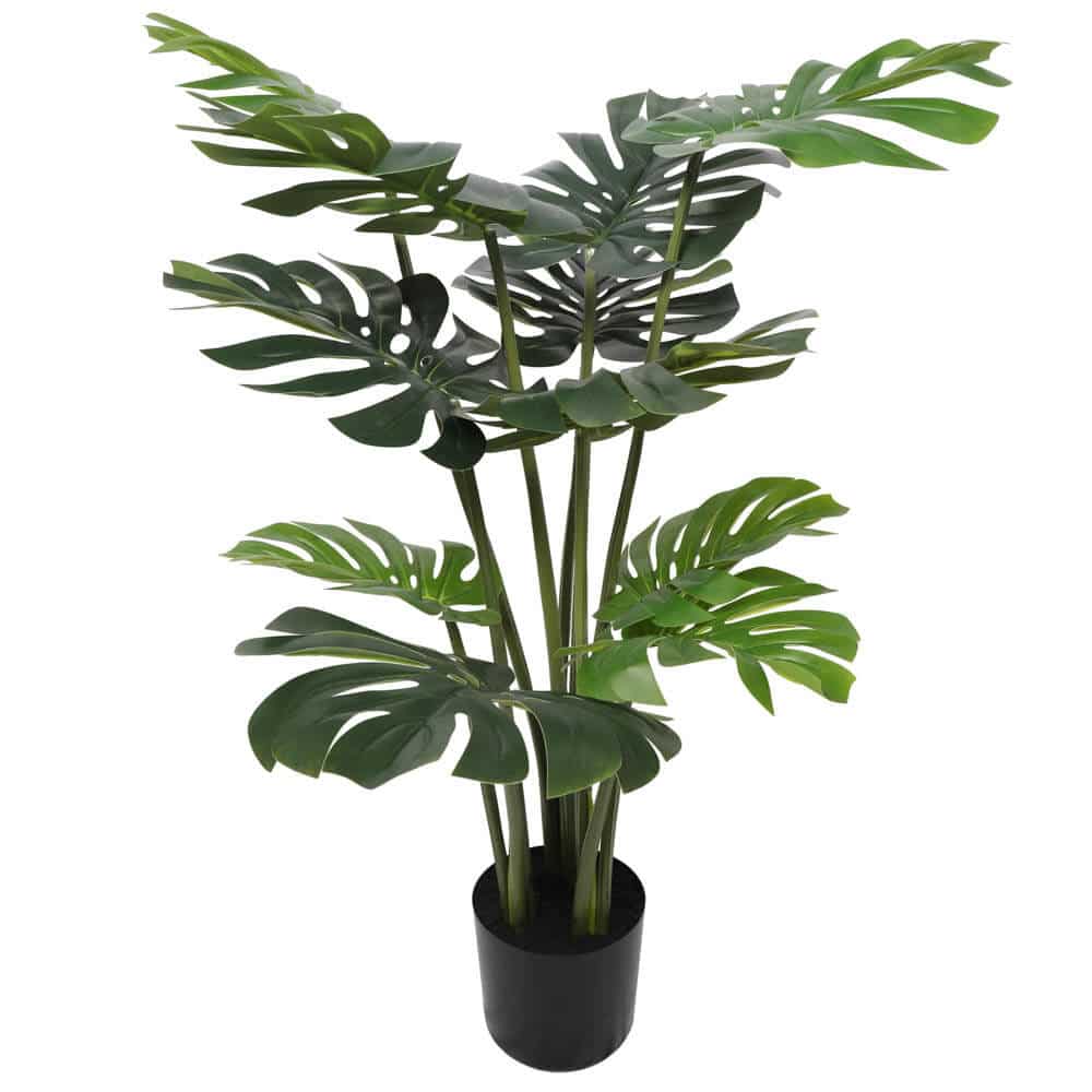 Potted artificial monstera plant on a white background