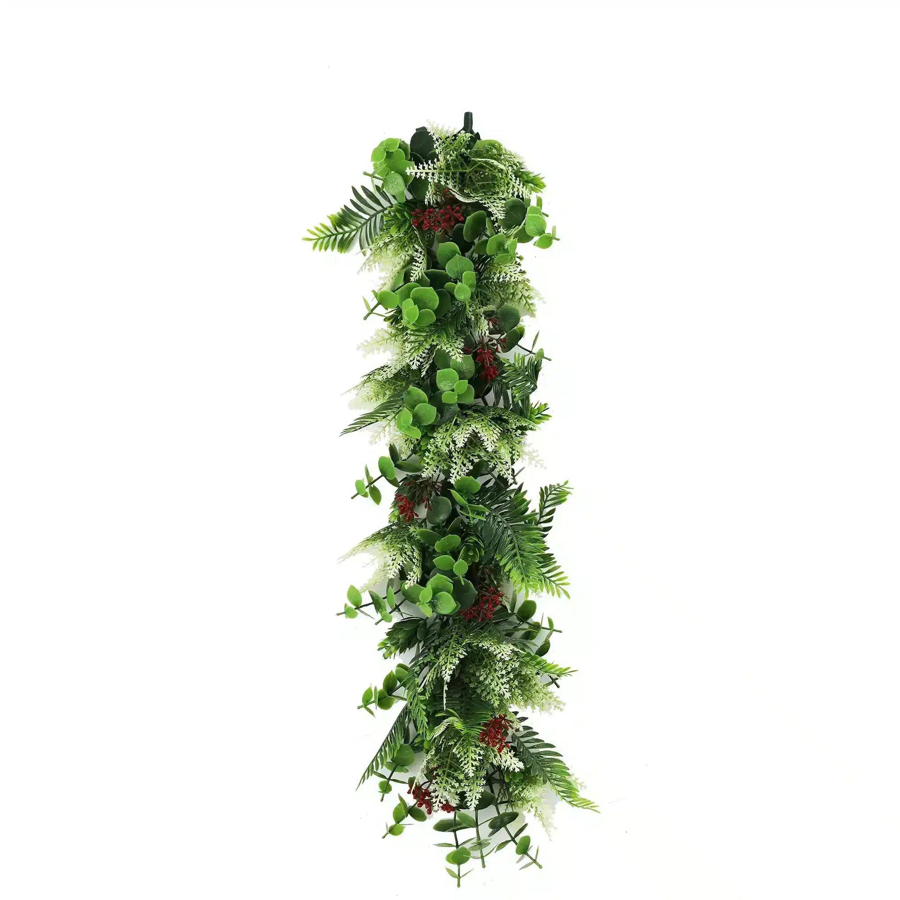 Artificial greenery garland with leaves and berries on a white background