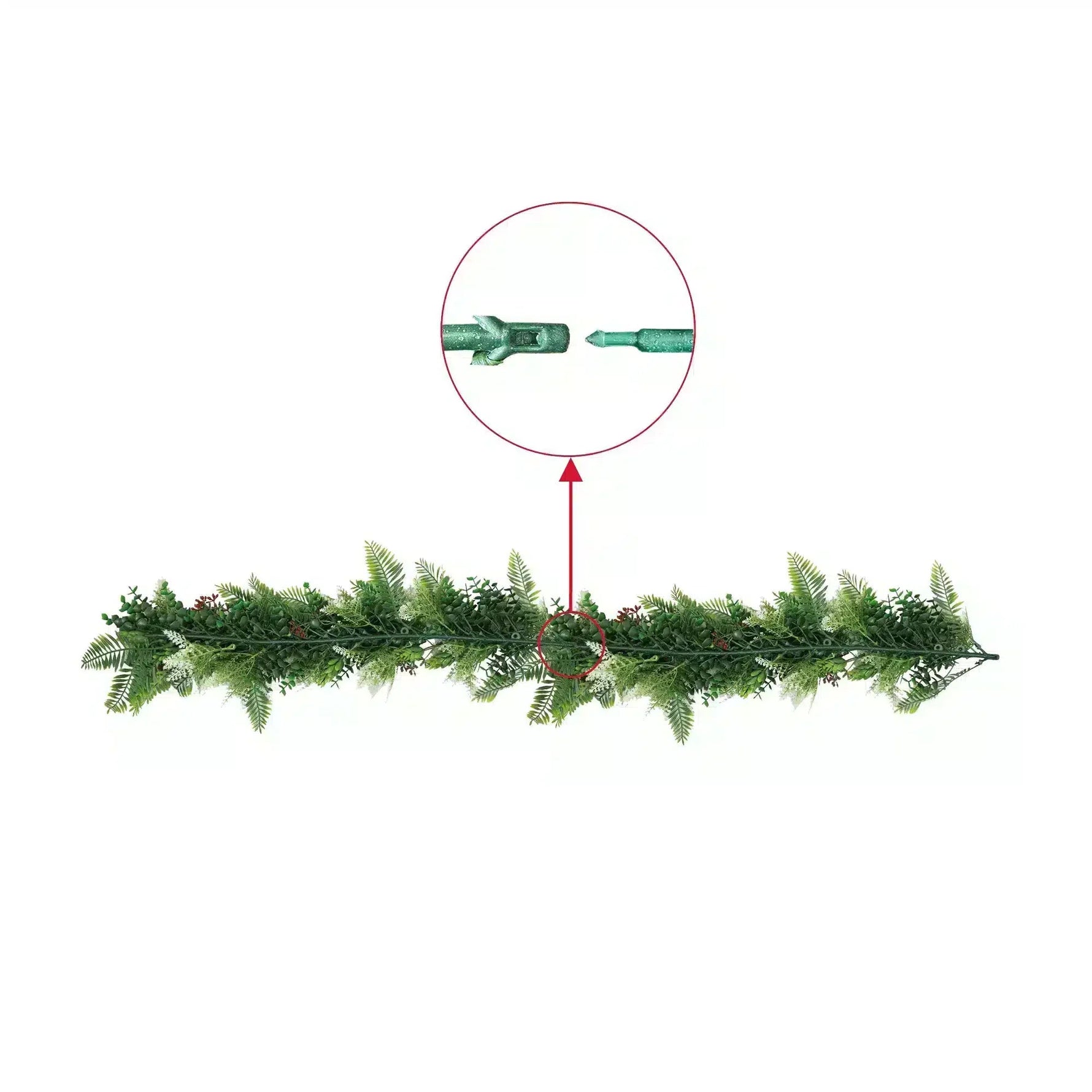 Green artificial Christmas garland with a close-up of the connector on a white background